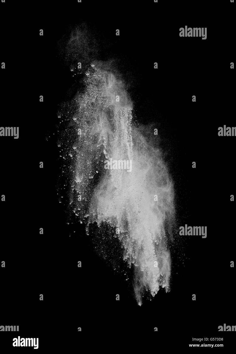 White powder explosion isolated on black background Stock Photo - Alamy
