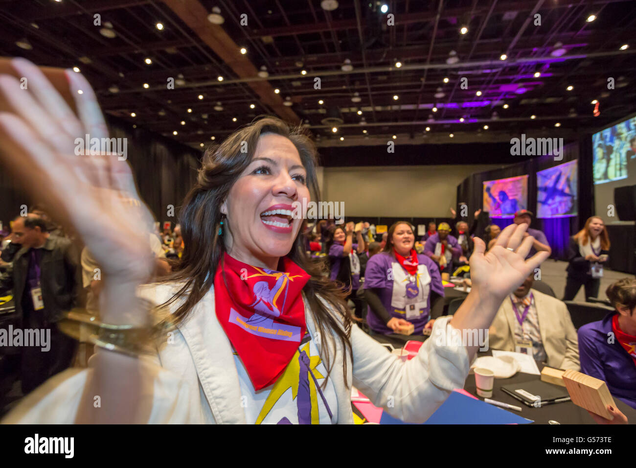 Detroit, Michigan - A delegate to the Service Employees International Union convention cheers a speaker. Stock Photo