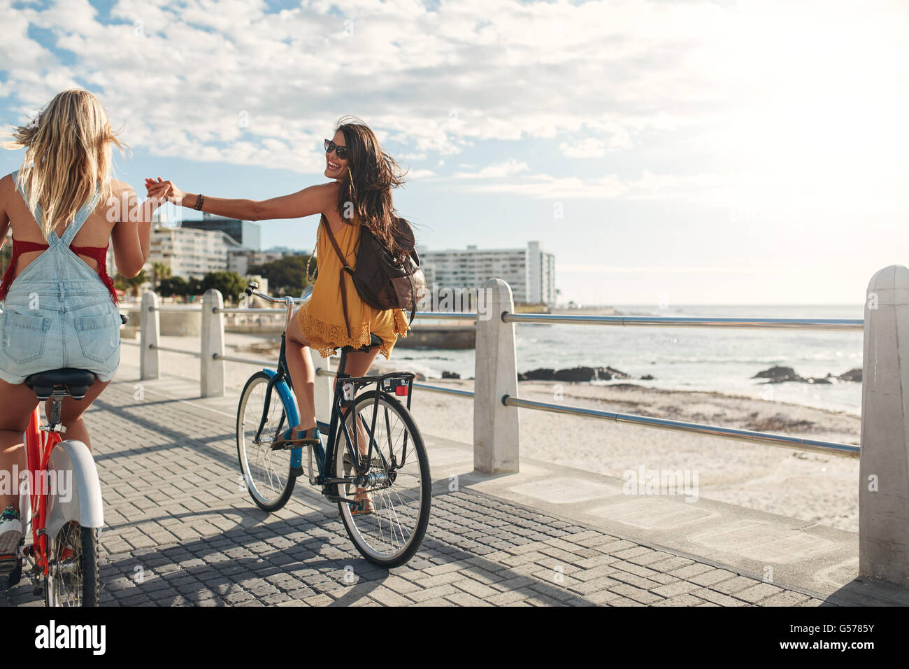 Two women hands holding hi-res stock photography and images - Alamy
