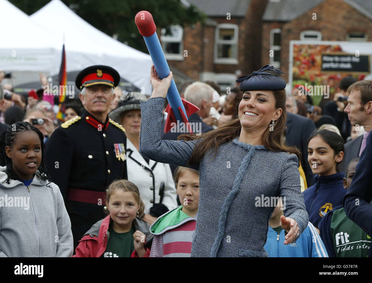 The Duchess of Cambridge throws a foam javelin at a children's sports event, during her visit to Vernon Park in Nottingham. Stock Photo