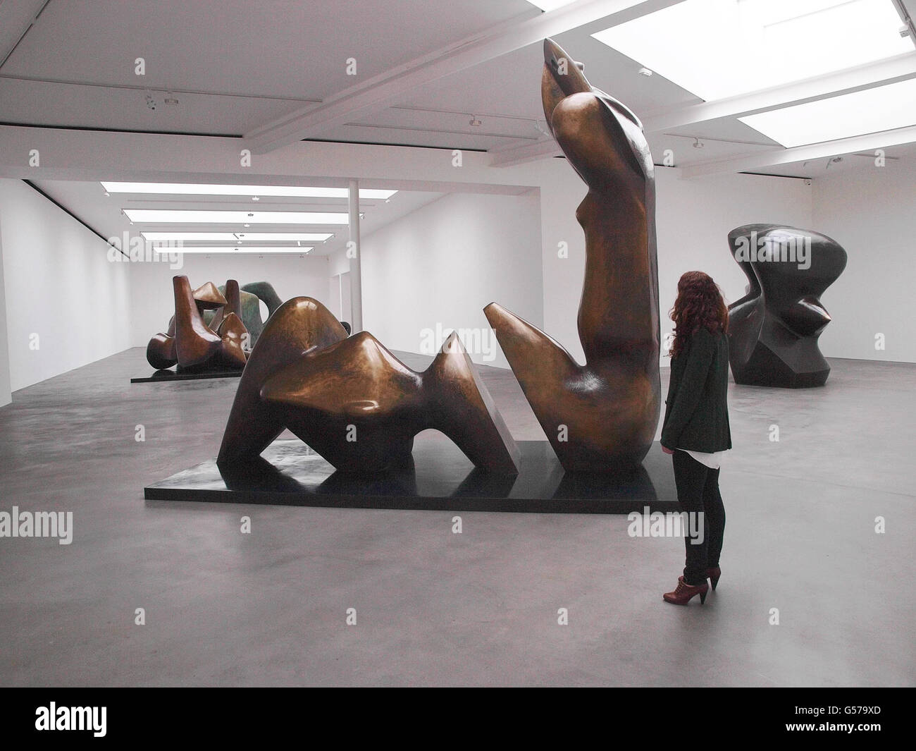 Gallery visitor Phoebe Moore looks at artist Henry Moore's Two Piece