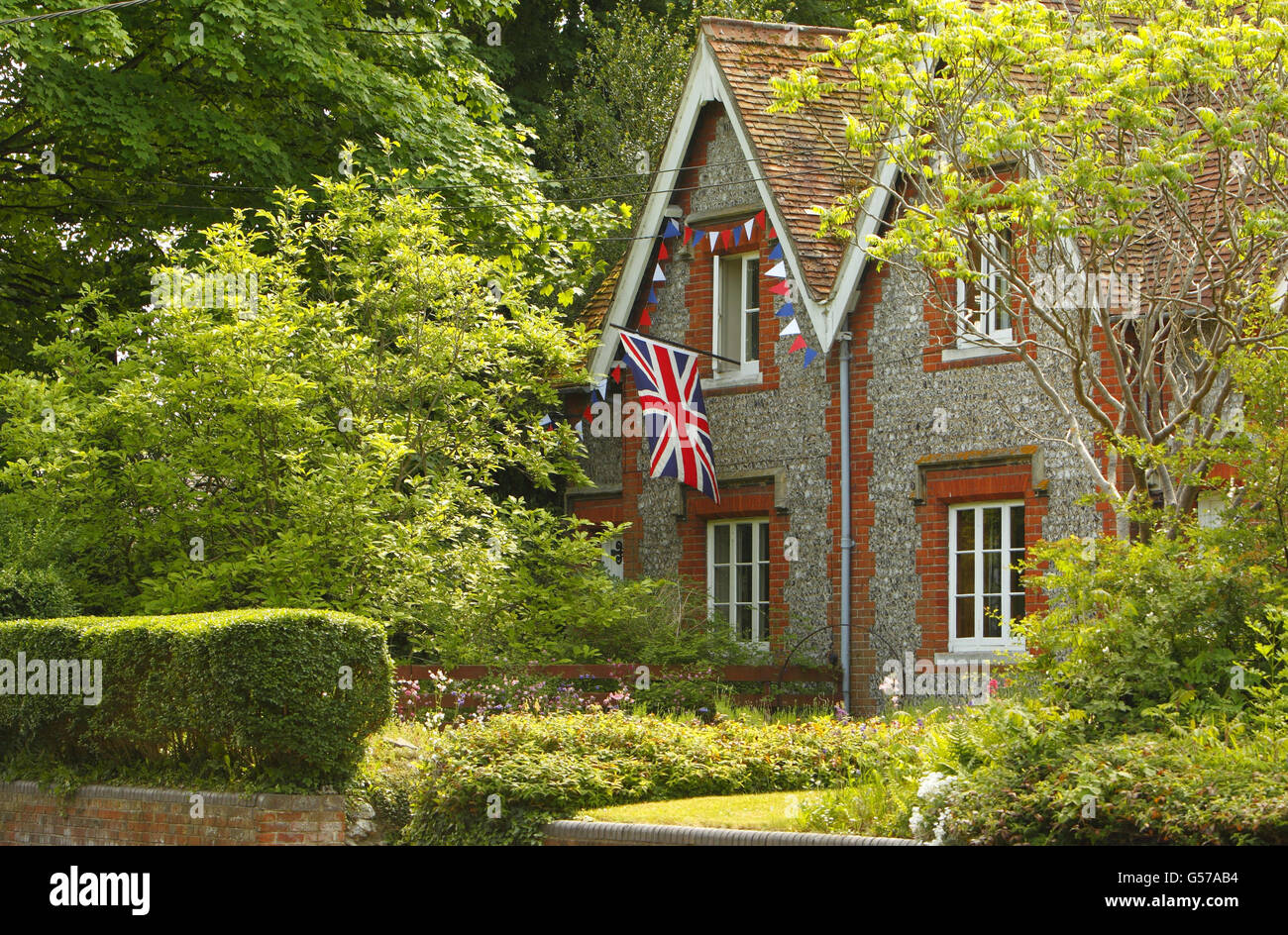 A Union flag flies from a house in Twyford, Hampshire, ahead of the