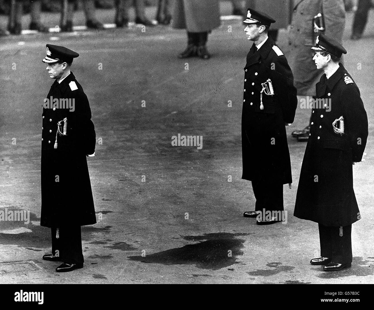 1936: King Edward VIII (formerly the Prince of Wales, later the Duke of Windsor) attends the Remembrance Day service at the Cenotaph in Whitehall, London. With him are his brothers, the Duke of York (later King George VI), centre, and the Duke of Kent (killed during the Second World War). Stock Photo