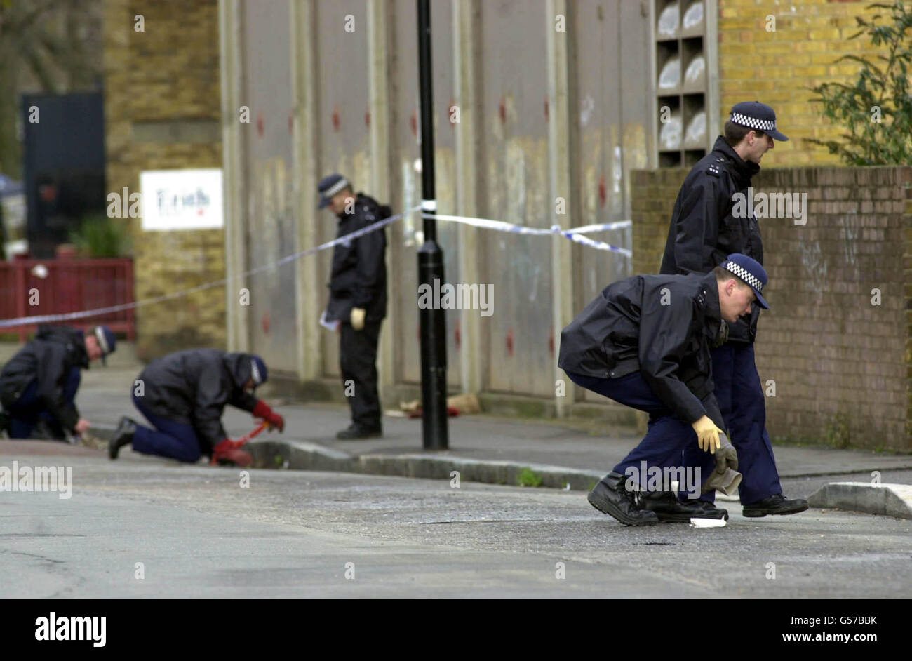 Crime officers search blakes road on the north peckham estate hires