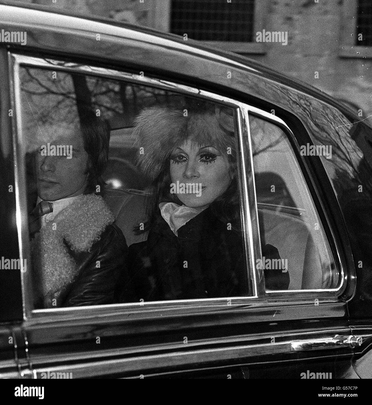 Model April Ashley pictured in a car in London, where judgement was to be given by Justice Ormrod in the Divorce Court in the nullity case in which he reserved judgement after a 16 day hearing.Among the questions the judge was asked to decide was whether Miss Ashley was a man or a womn when she went through a marriage ceremony with Arthur Cameron Corbett. Stock Photo
