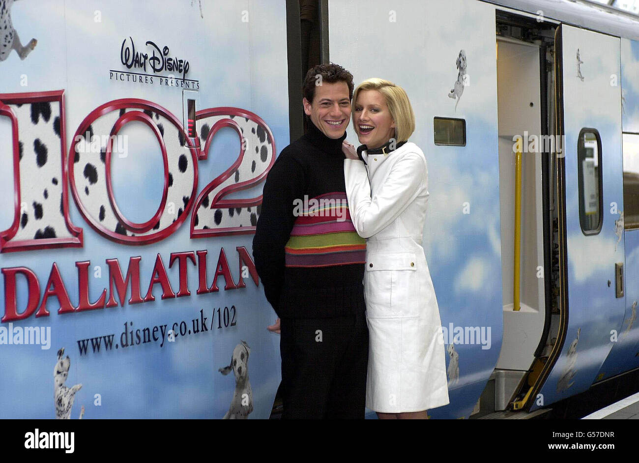 Alice Evans who plays Chloe Simon and Ioan Gruffudd who plays Kevin Sheperd in the new film 102 Dalmations at Waterloo Station in London, to launch Disney's 102 Dalmations Eurostar train. * All 18 coaches of the train are covered with images of Dalmation puppies and the train will be in service on the Brussels, Paris and Disneyland Paris routes. Stock Photo