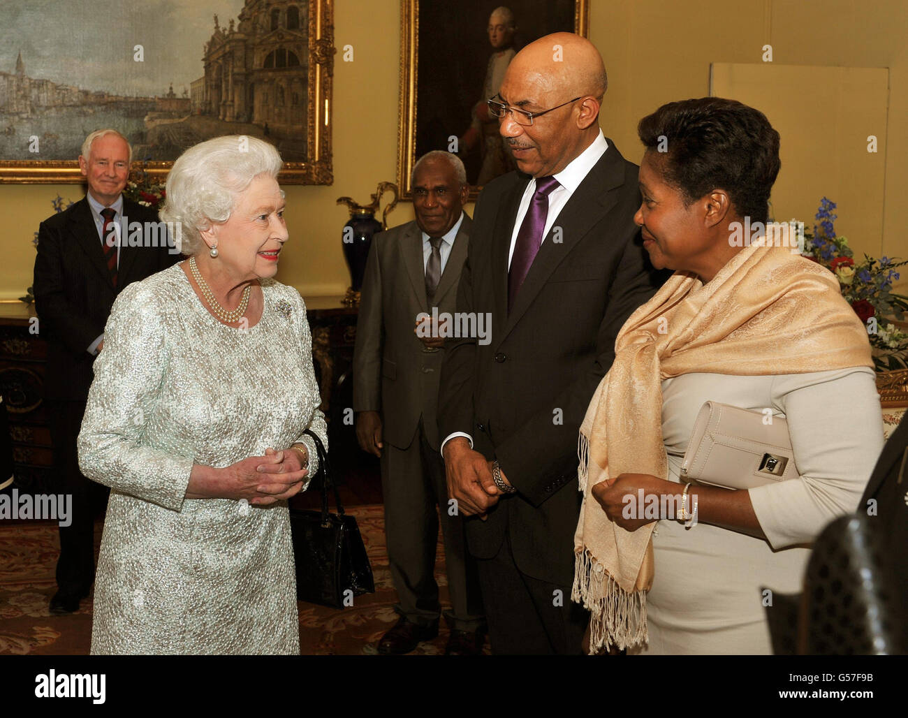 The Queen Elizabeth II talks with Sir Patrick Allen (2nd right) the Governor General of Jamaica