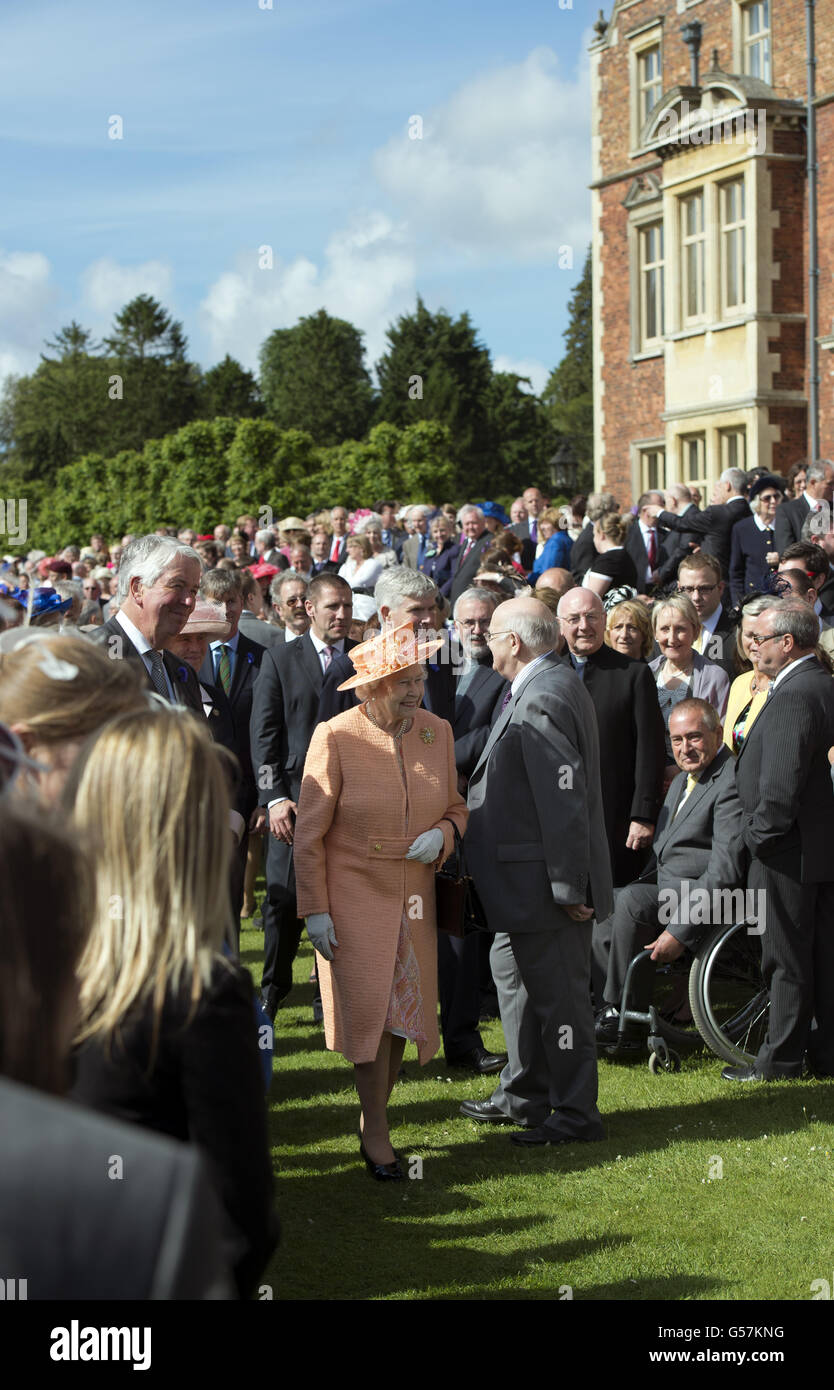 Queen Elizabeth II meets guests during a garden party in honour of her