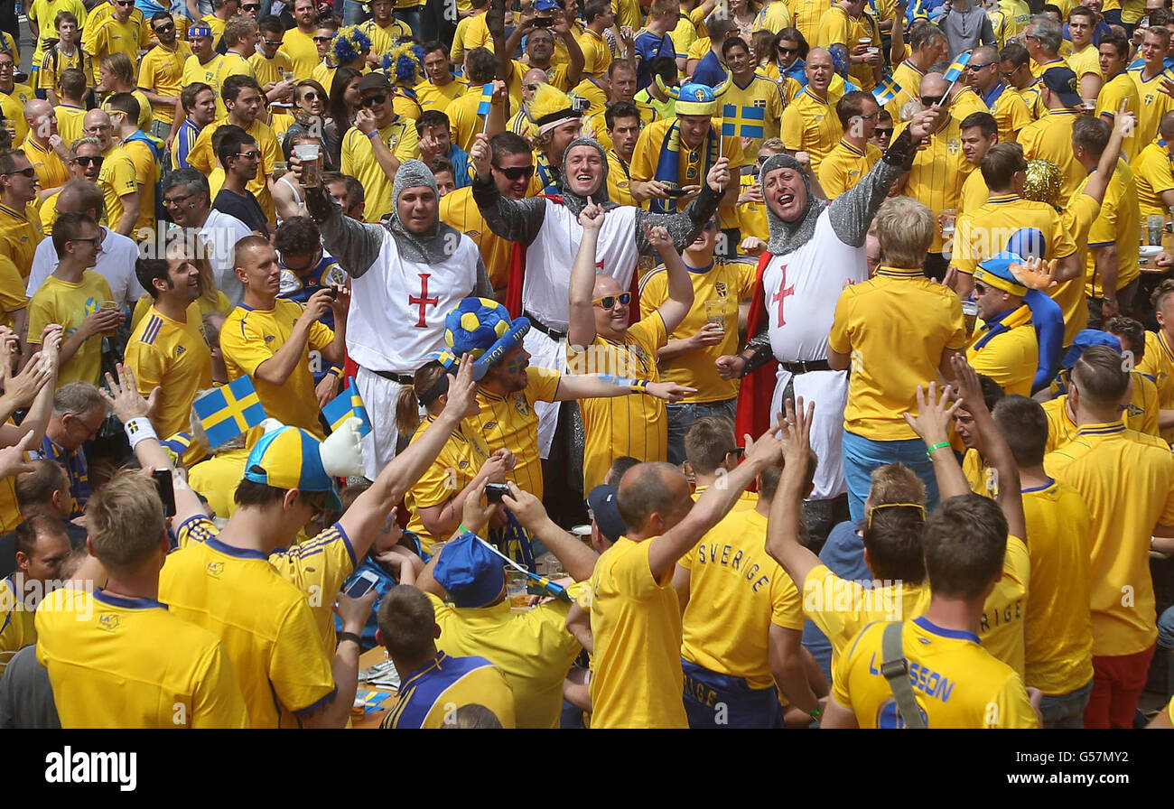 England fans surrounded by Swedish fans in the fan zone in the centre of Kiev Stock Photo