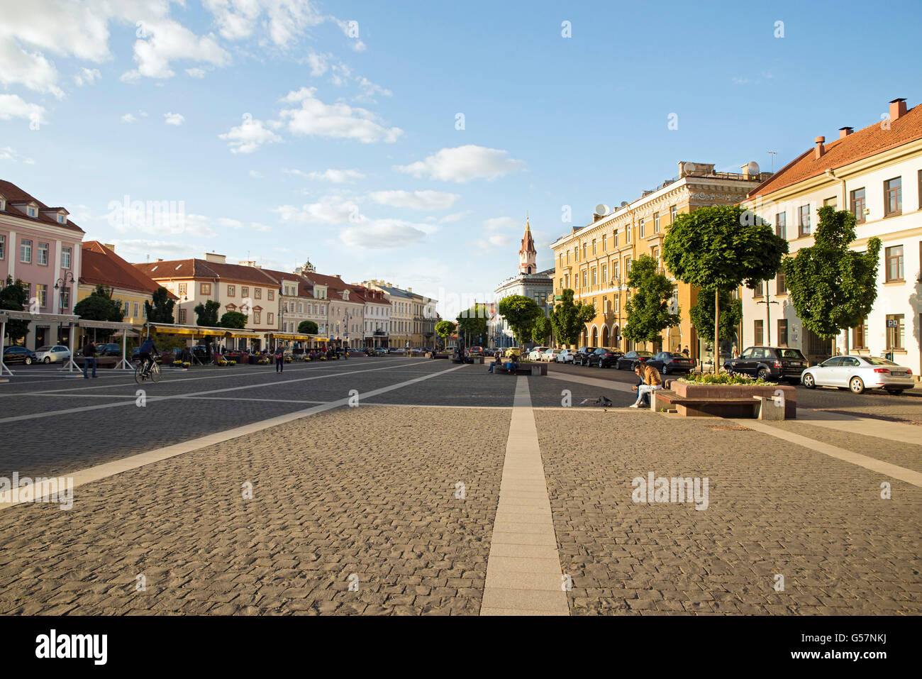 VILNIUS, LITHUANIA - JUNE 7, 2016: People at the historical Town Hall Square  in the Old Town of Vilnius. Stock Photo