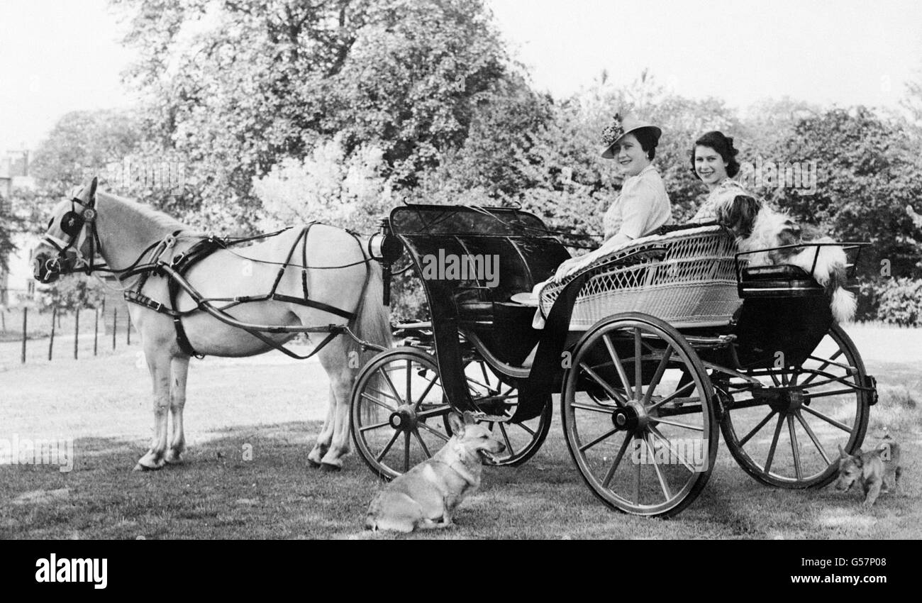 Princess elizabeth and queen elizabeth, seated in a horse drawn ...