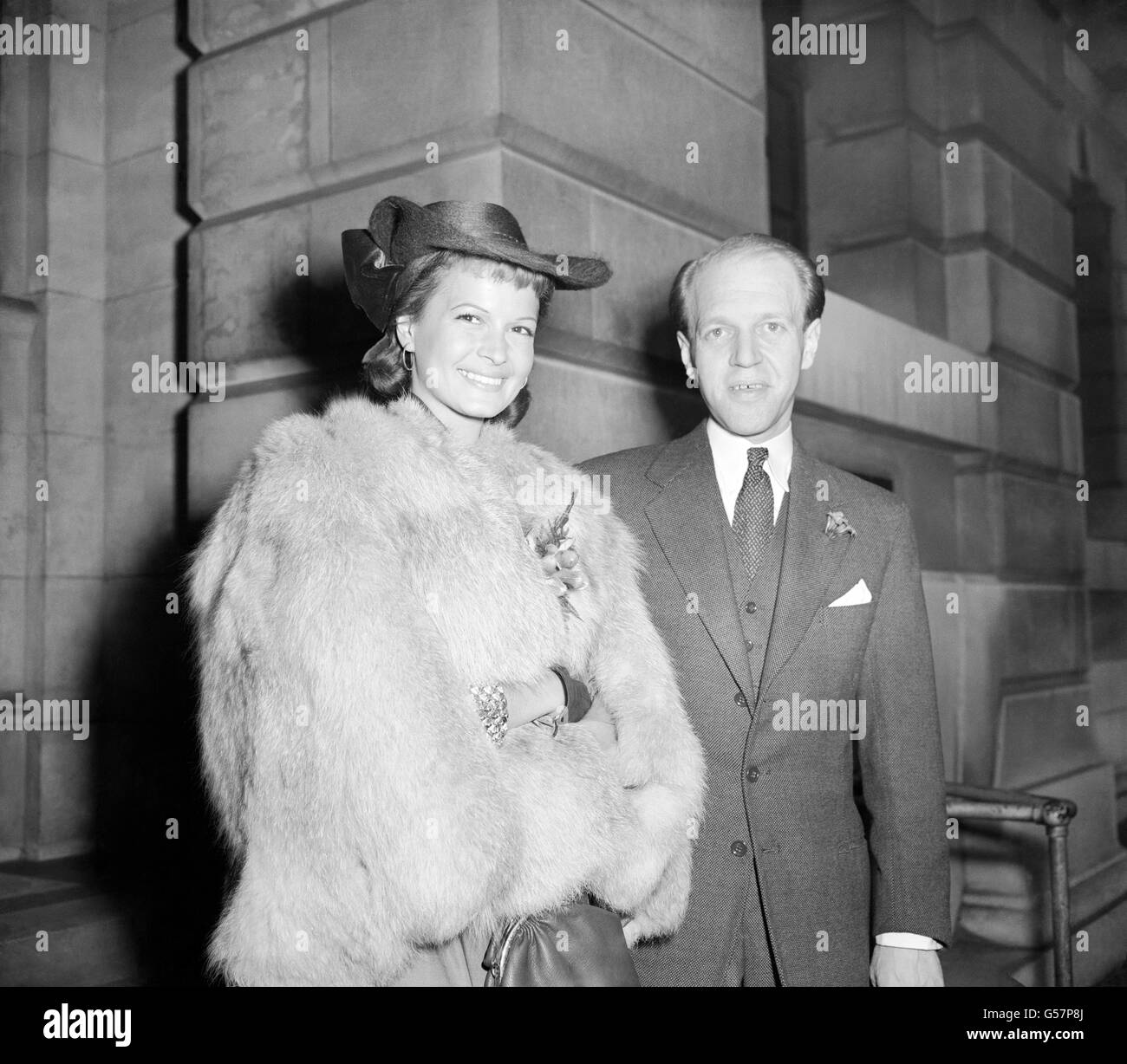 Eva Bartok, the Hungarian actress, with her husband, William Wordsworth, the theatrical publicity agent, after their wedding at St Pancras Town Hall, London. Stock Photo