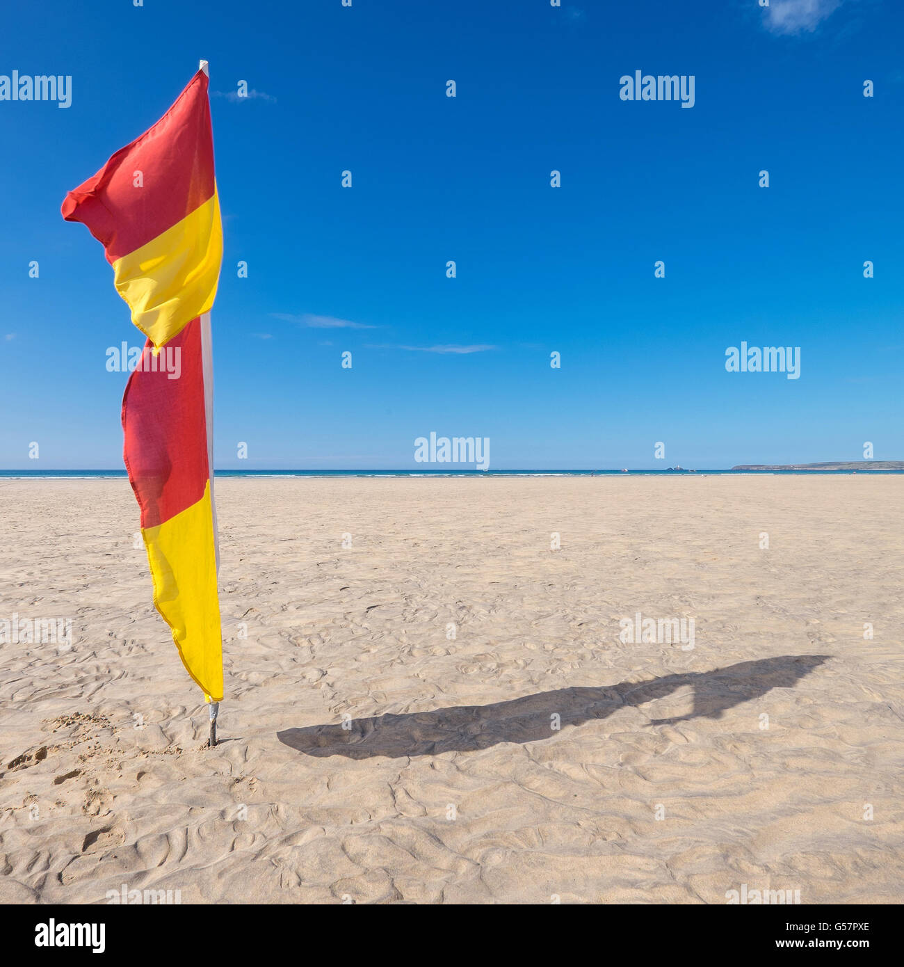RNLI Safety Flag red and yellow Porthkidney Beach Lelant Cornwall Stock