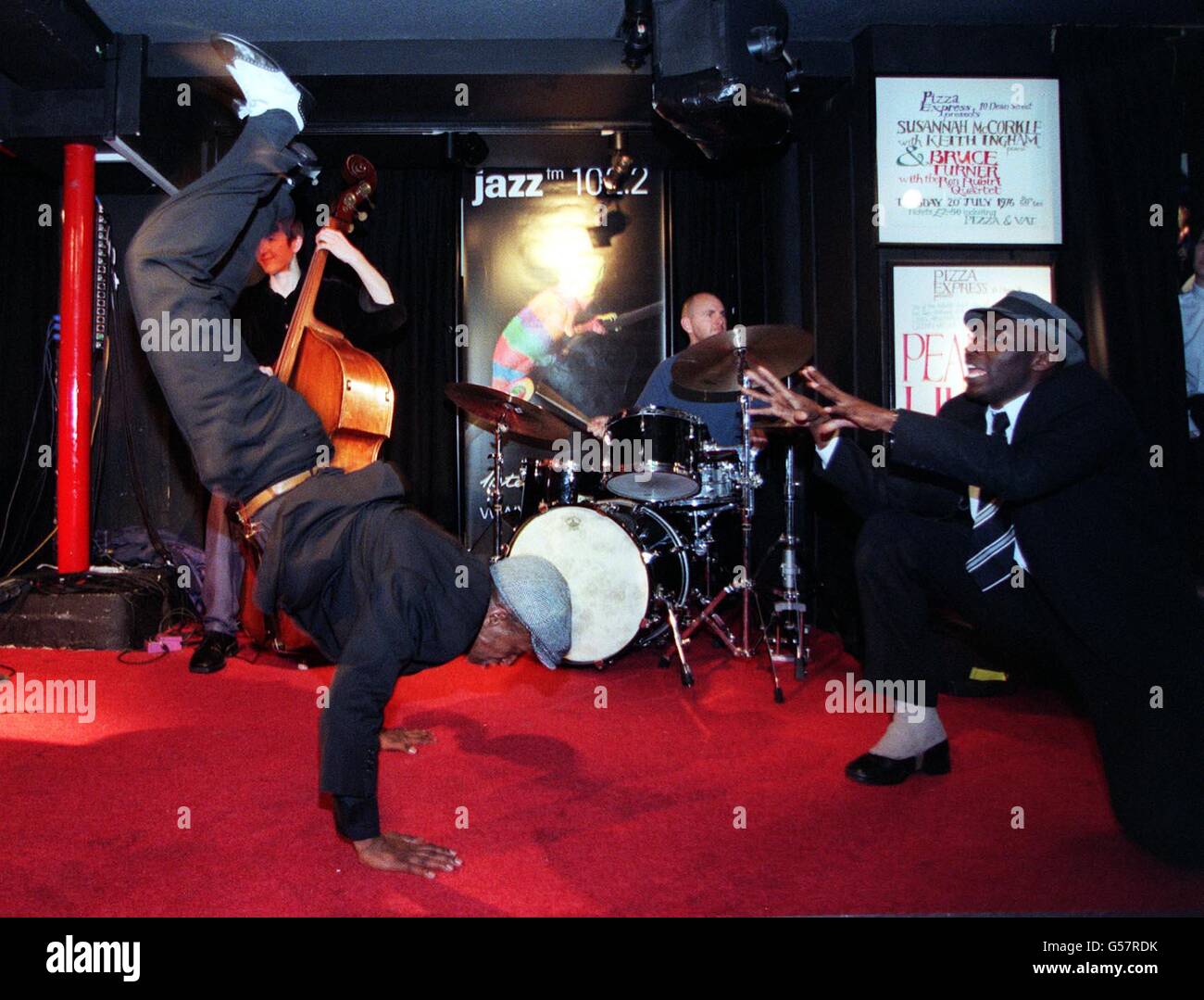 Dancer Kola (L) and Perry at the launch of JAZZWORKS at London's  PizzaExpress in Dean Street, central London. JAZZWORKS, organised by radio  station JAZZ FM, is a series of school workshops. *