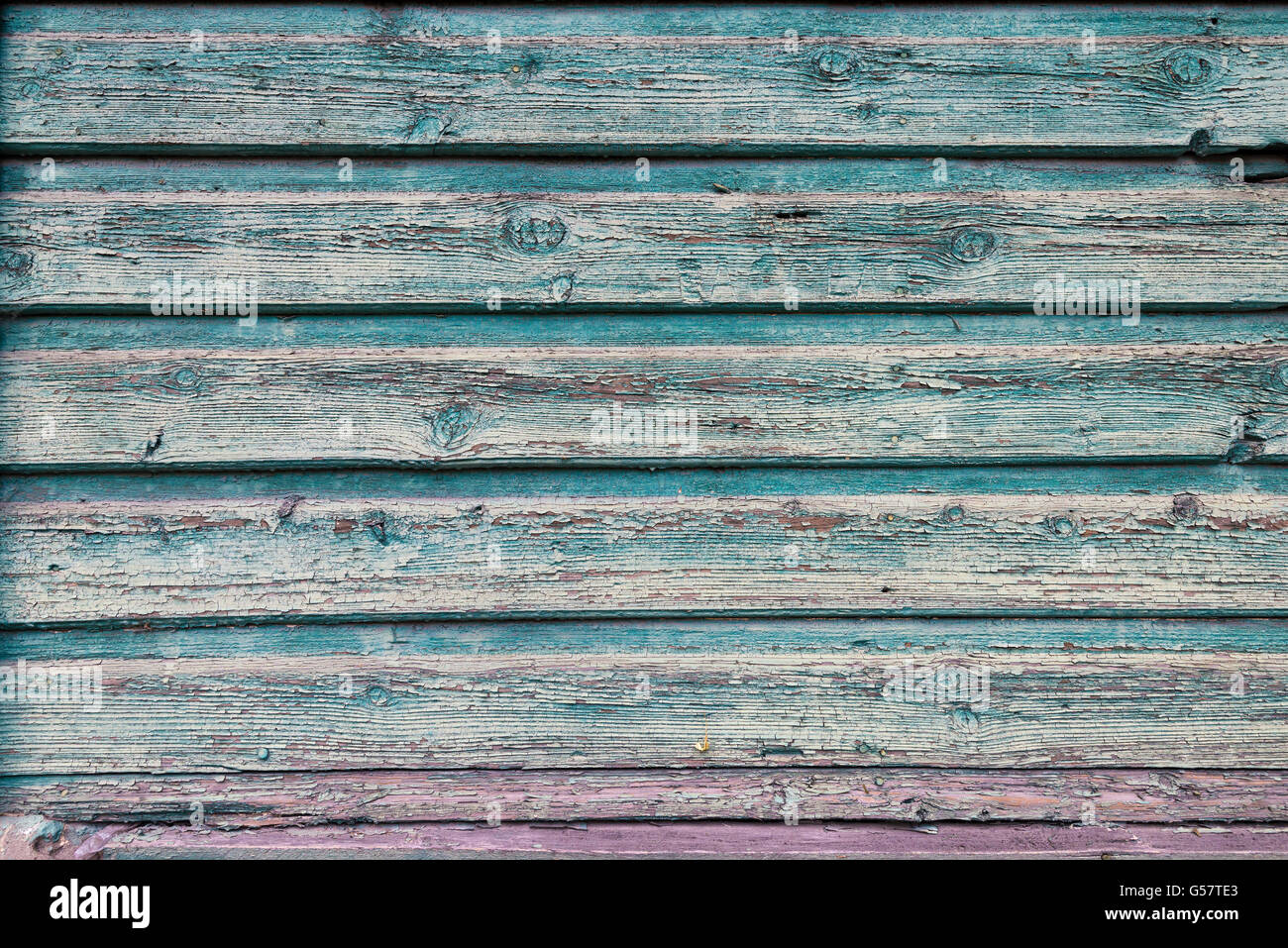 old wooden fence painted in green background Stock Photo - Alamy
