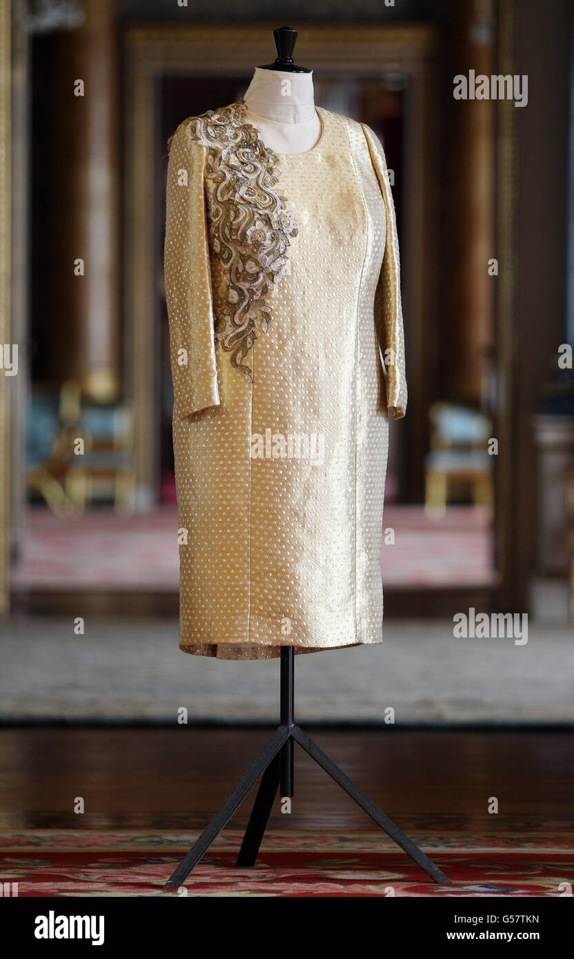 The dress worn by Queen Elizabeth II at the the Diamond Jubilee Concert at Buckingham Palace which was esigned and created by Miss Angela Kelly, MVO. Stock Photo