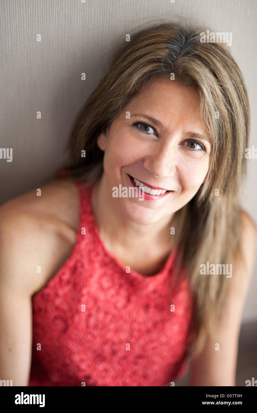 Close Up Pretty 50 Year Old Woman Leaning Against The Wall And Looking  Close Up Pretty 50 Year Old Woman Leaning Against The Wall And Looking