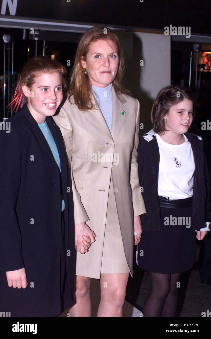 The Duchess of York with their two children Princesses Beatrice (left) and Eugenie, arriving for the European Premiere of '102 Dalmations' at the Odeon cinema, in Leicester Square, London. R/I: 25/3/01. Stock Photo