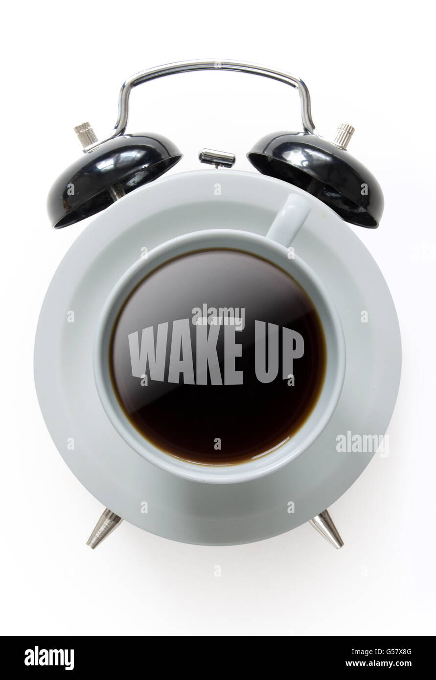 Alarm clock with wake up coffee in the middle Stock Photo