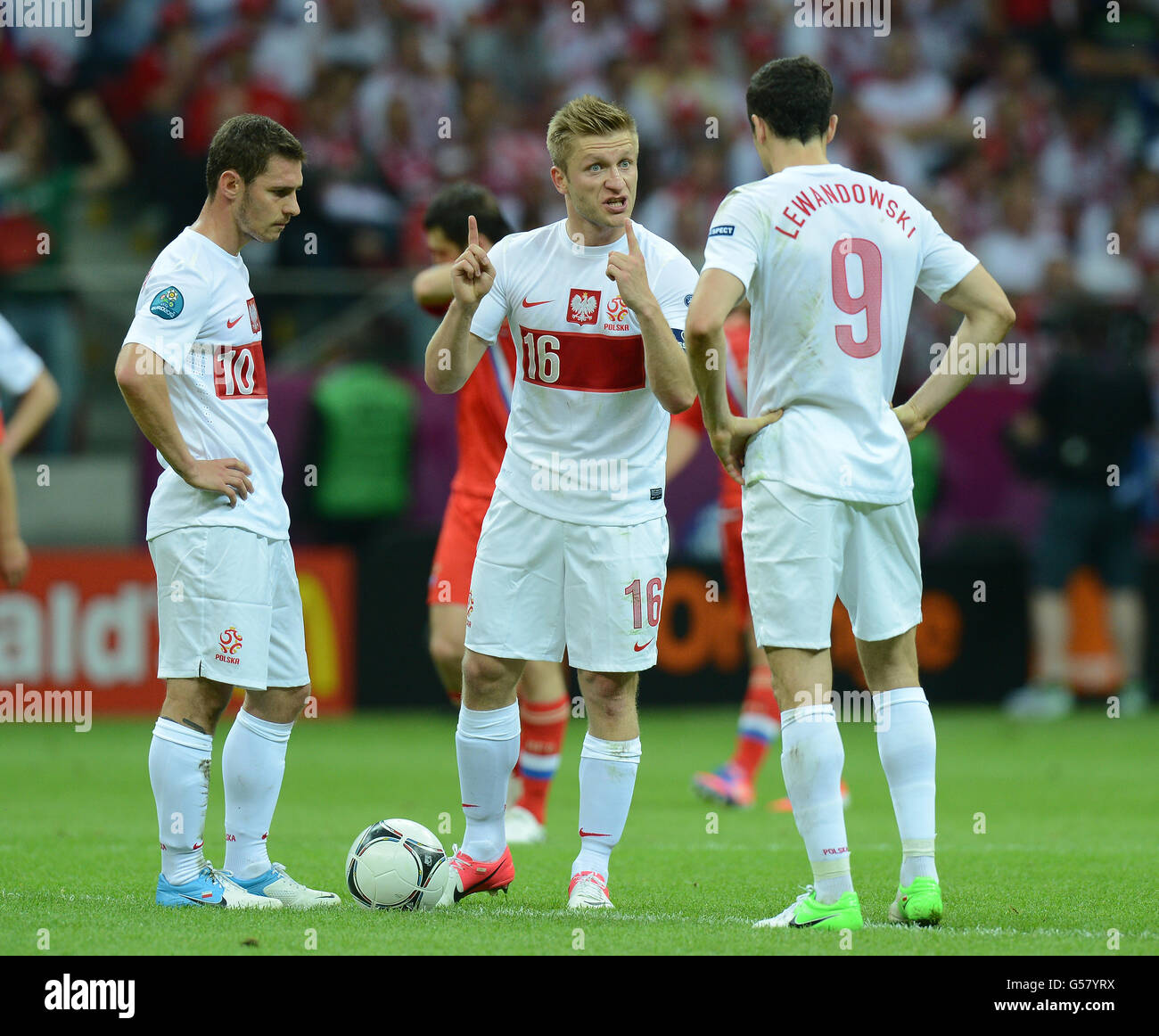 Soccer - UEFA Euro 2012 - Group A - Poland v Russia - National Stadium. Poland's Jakub Blaszczykowski (centre) and Robert Lewandowski (right) Stock Photo