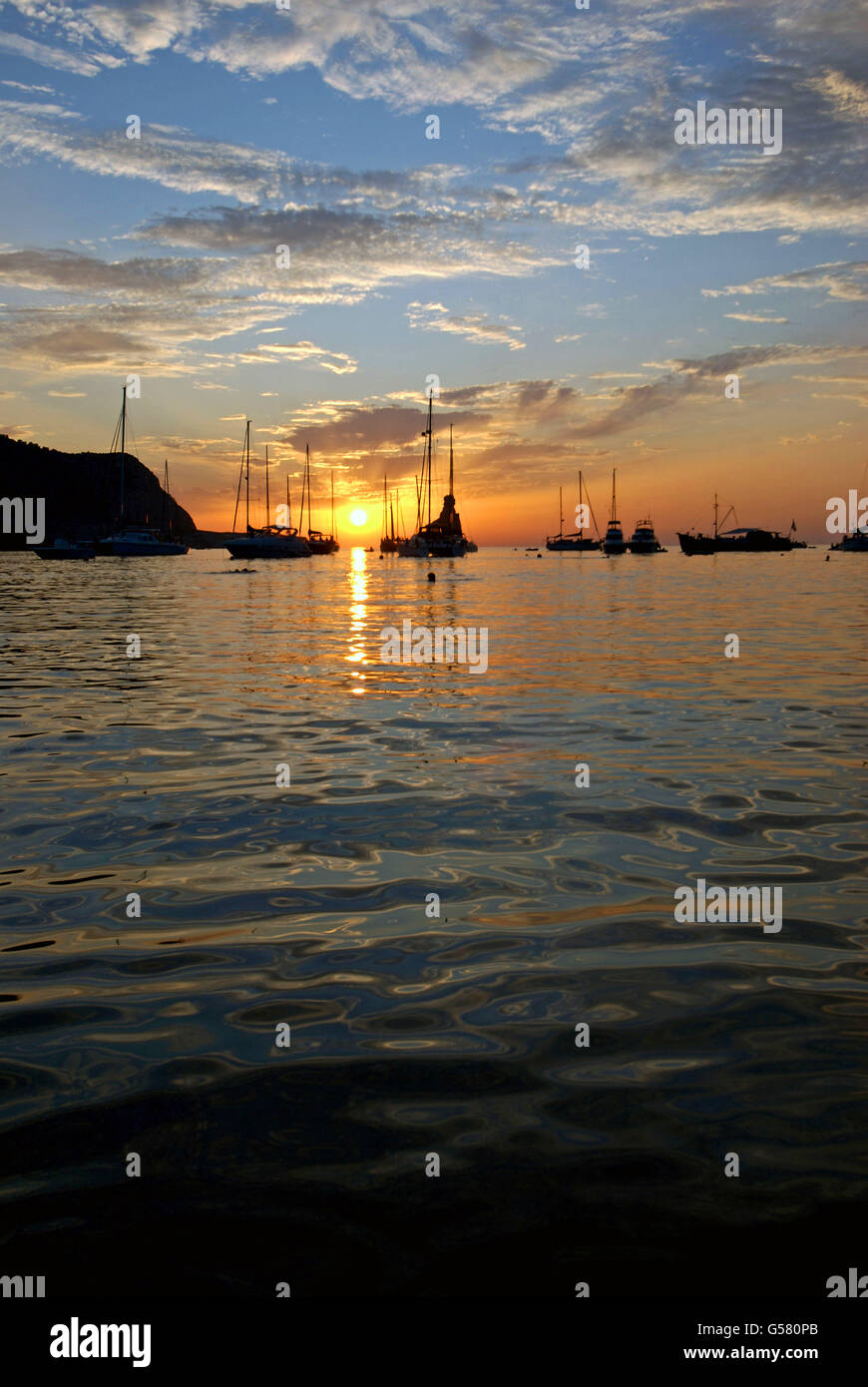 Secluded bay in the North of Ibiza, famous for impromptu drumming concerts, and where many people get together every sunday Stock Photo