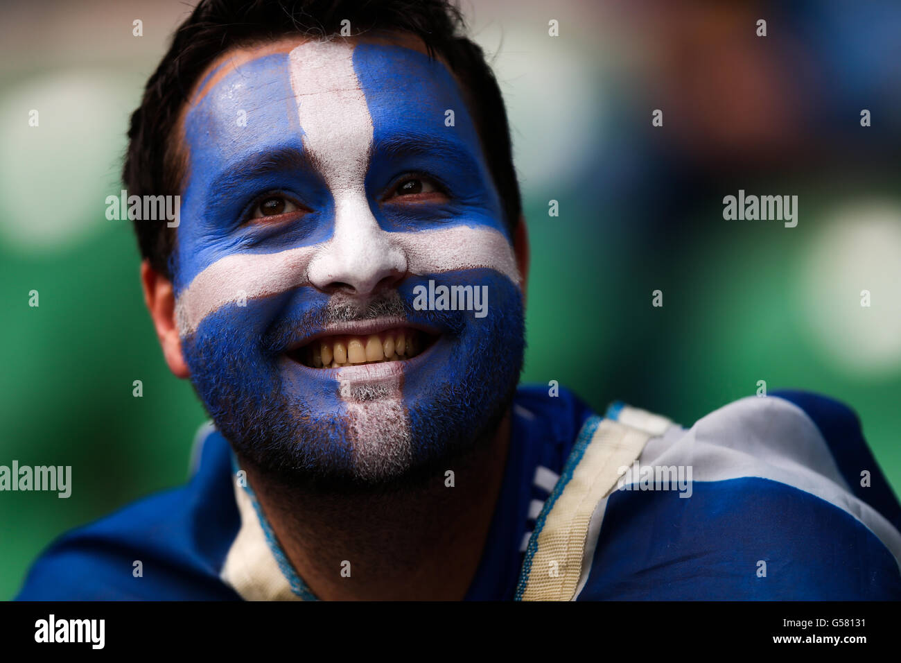 Soccer - UEFA Euro 2012 - Group A - Greece v Czech Republic - Municipal Stadium. A Greek fan shows support for his team in the stands Stock Photo