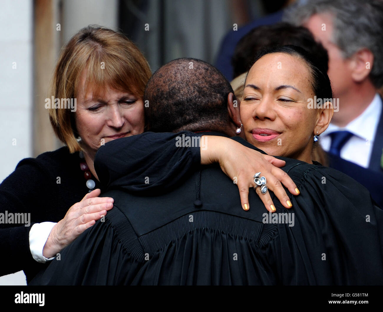 Labour MP Harriet Harman (left) and Oona King (right) hug, with Speaker's Chaplain, the Reverend Rose Hudson-Wilkin, as they leave following a Service of Prayer and Remembrance to commemorate murdered MP Jo Cox, at St Margaret's in Westminster, central London. Stock Photo