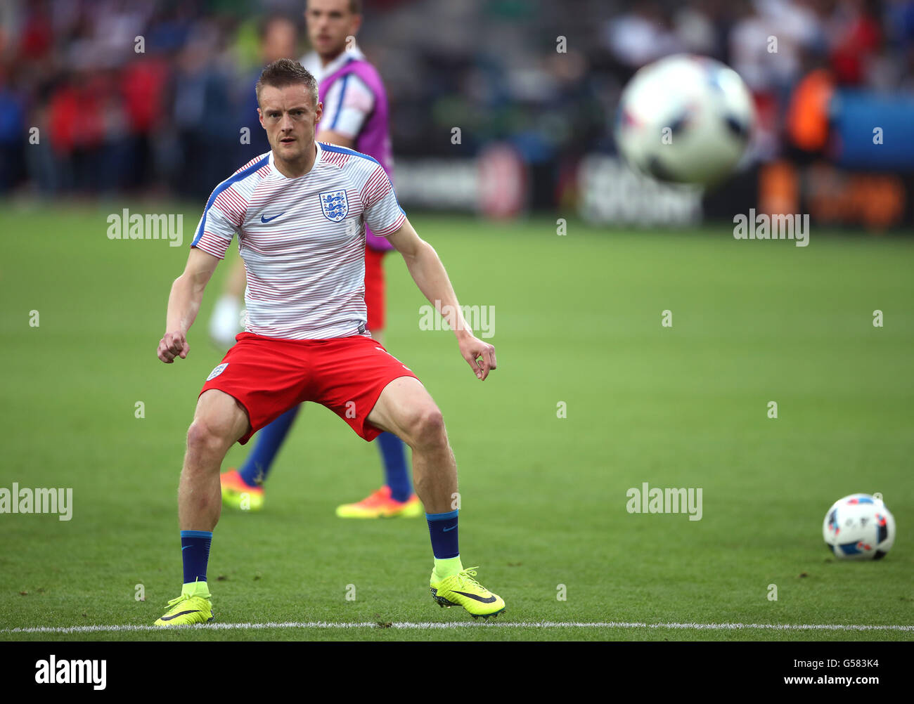 England's Jamie Vardy warms up before the UEFA Euro 2016, Group B match at the Stade Geoffroy Guichard, Saint-Etienne. Stock Photo