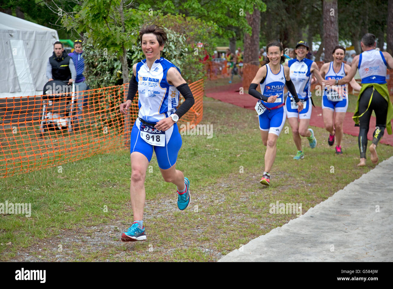 Team of runners women competing in Triathlon of Mimizam France Stock