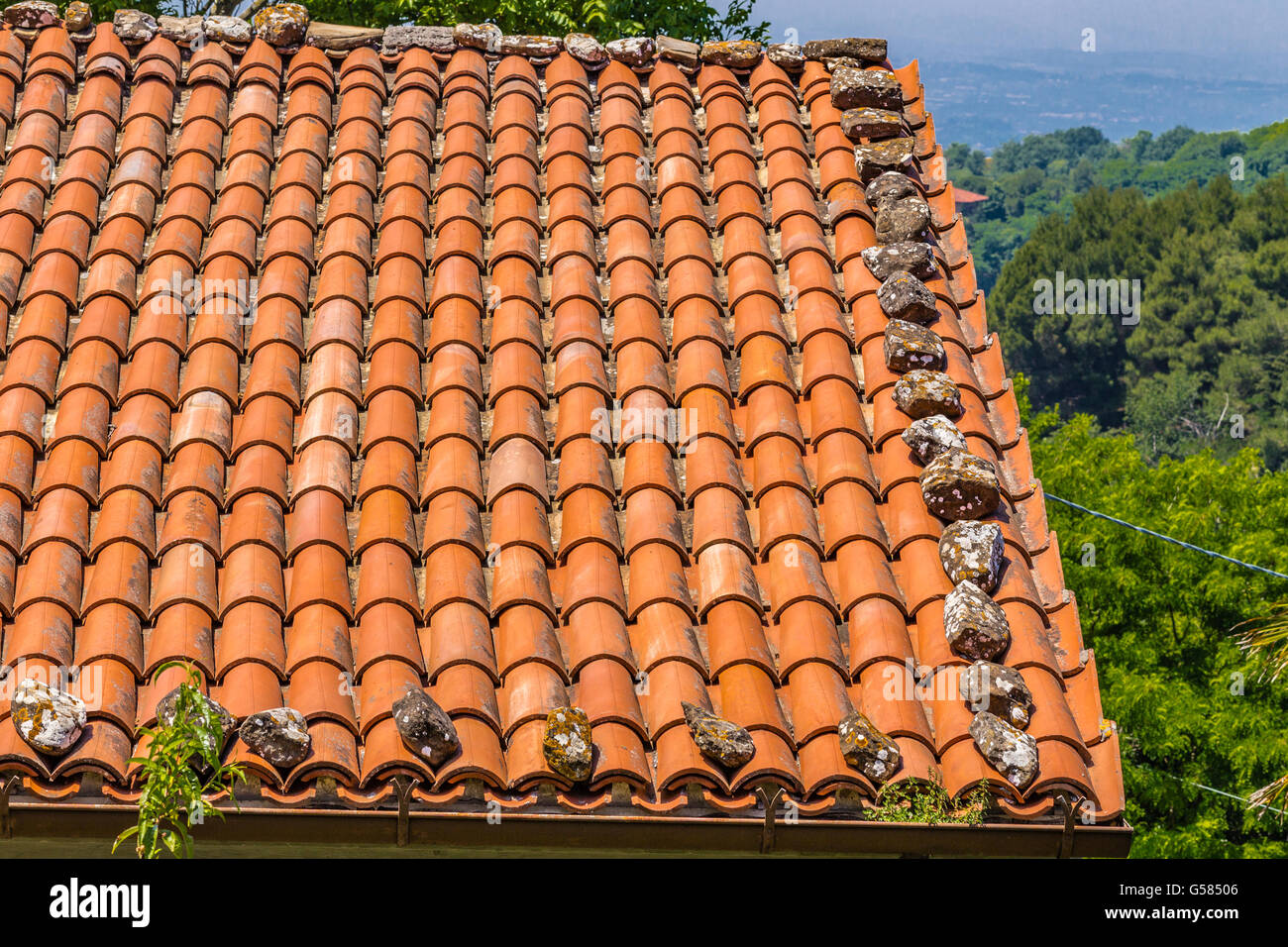 tiles of ancient village roofs in Italy Stock Photo