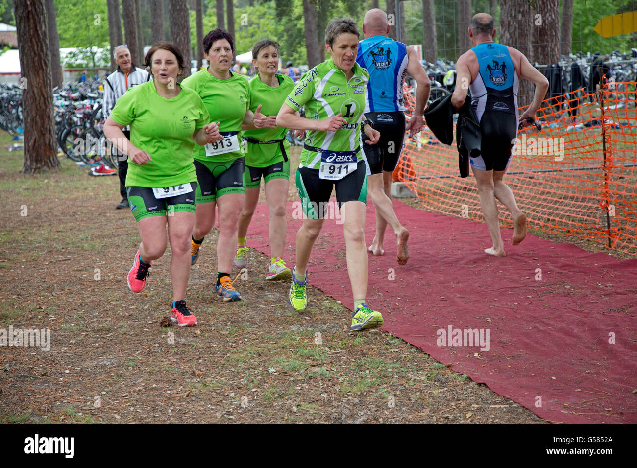 Team of women runners competing in Triathlon of Mimizam France Stock