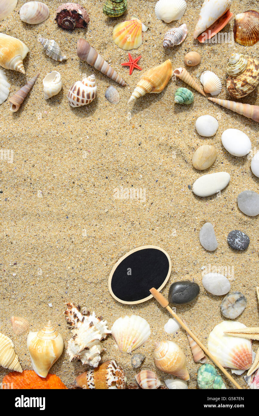 Sand, seashells and starfish on a wooden background Stock Photo - Alamy