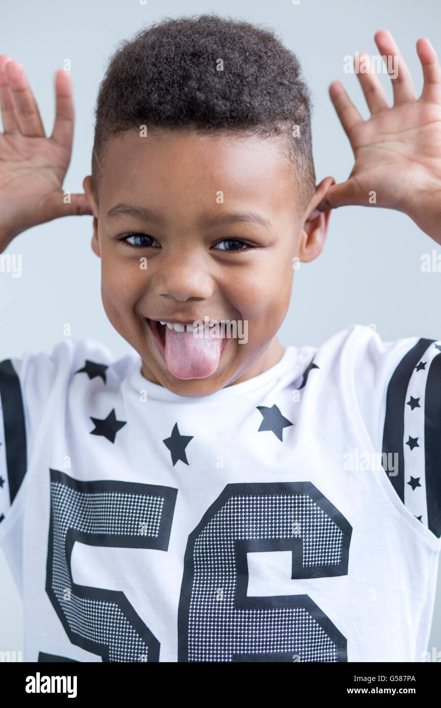 young boy pulling a face at the camera Stock Photo