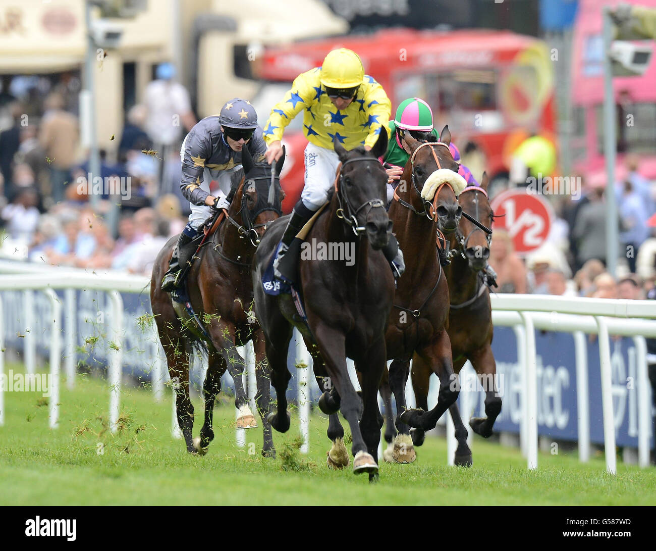 Side Glance ridden by Jimmy Fortune wins of The Investec Diomed Stakes during Investec Ladies' Day of the Investec Derby Festival at Epsom Racecourse. Stock Photo