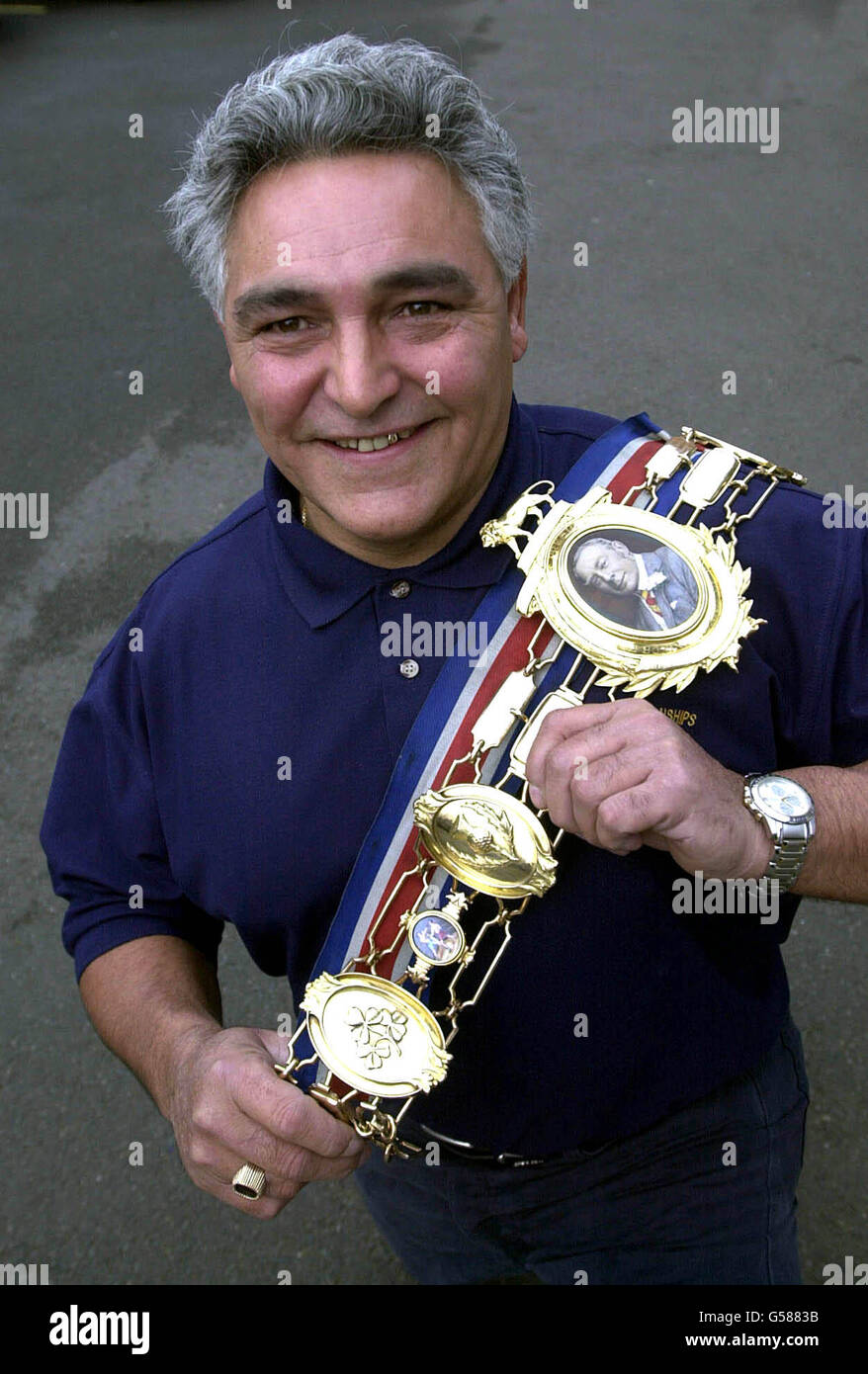 Successful bidder, Tony Baker with the hallmarked nine-carat gold Lonsdale Belt won by legendary boxer Randolph Turpin in the 1950s which cost him 23,000 during an auction in Birmingham's jewellery quarter. *...awarded to Turpin by the British Boxing Board of Control after he won the national light-heavyweight title for a third time. Businessman Baker fought off the challenge of other boxing enthusiasts to land the belt. Stock Photo