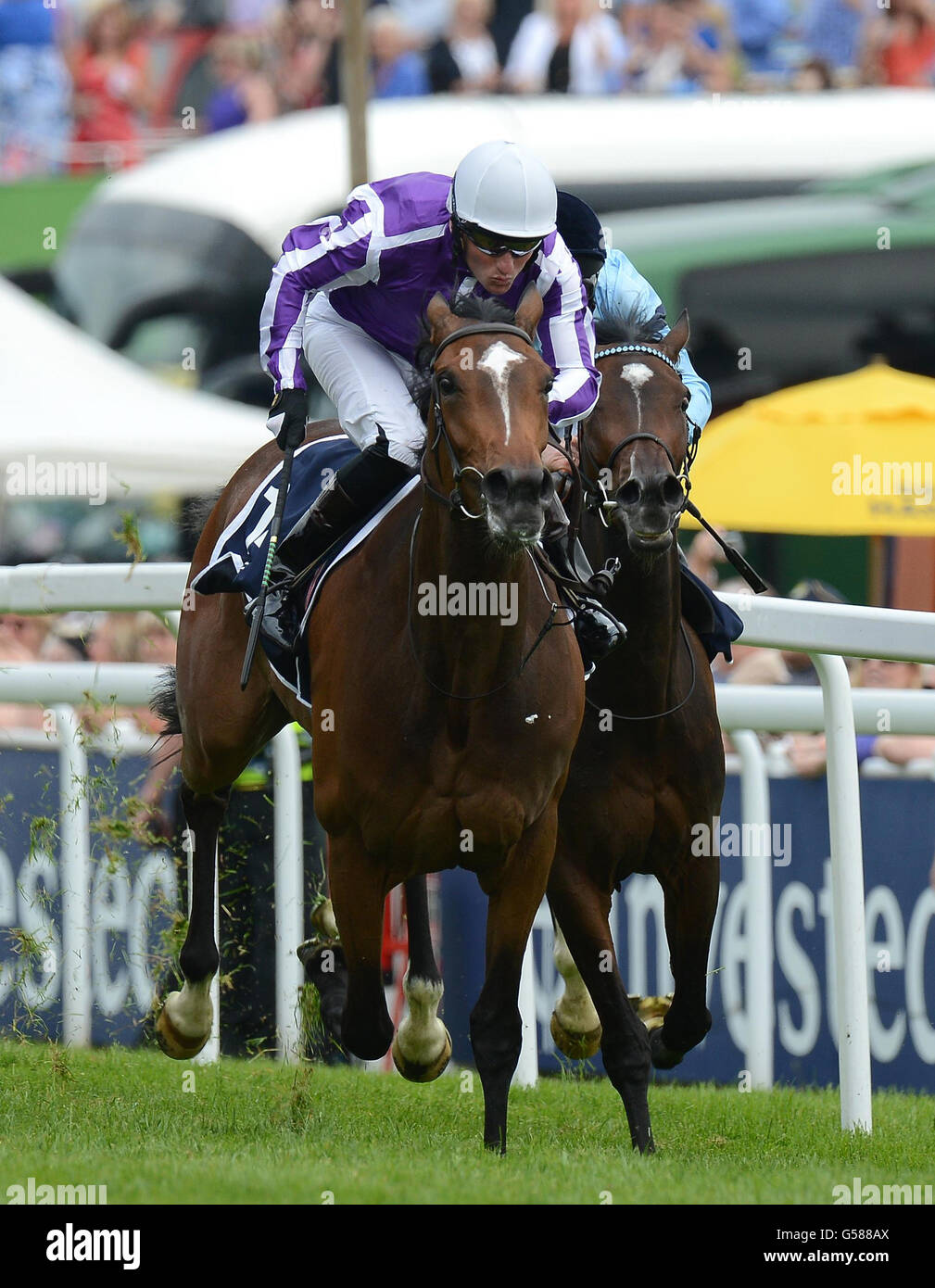 Was, ridden by Seamie Heffernan goes on to win The Investec Oaks during Investec Ladies' Day of the Investec Derby Festival at Epsom Racecourse. Stock Photo