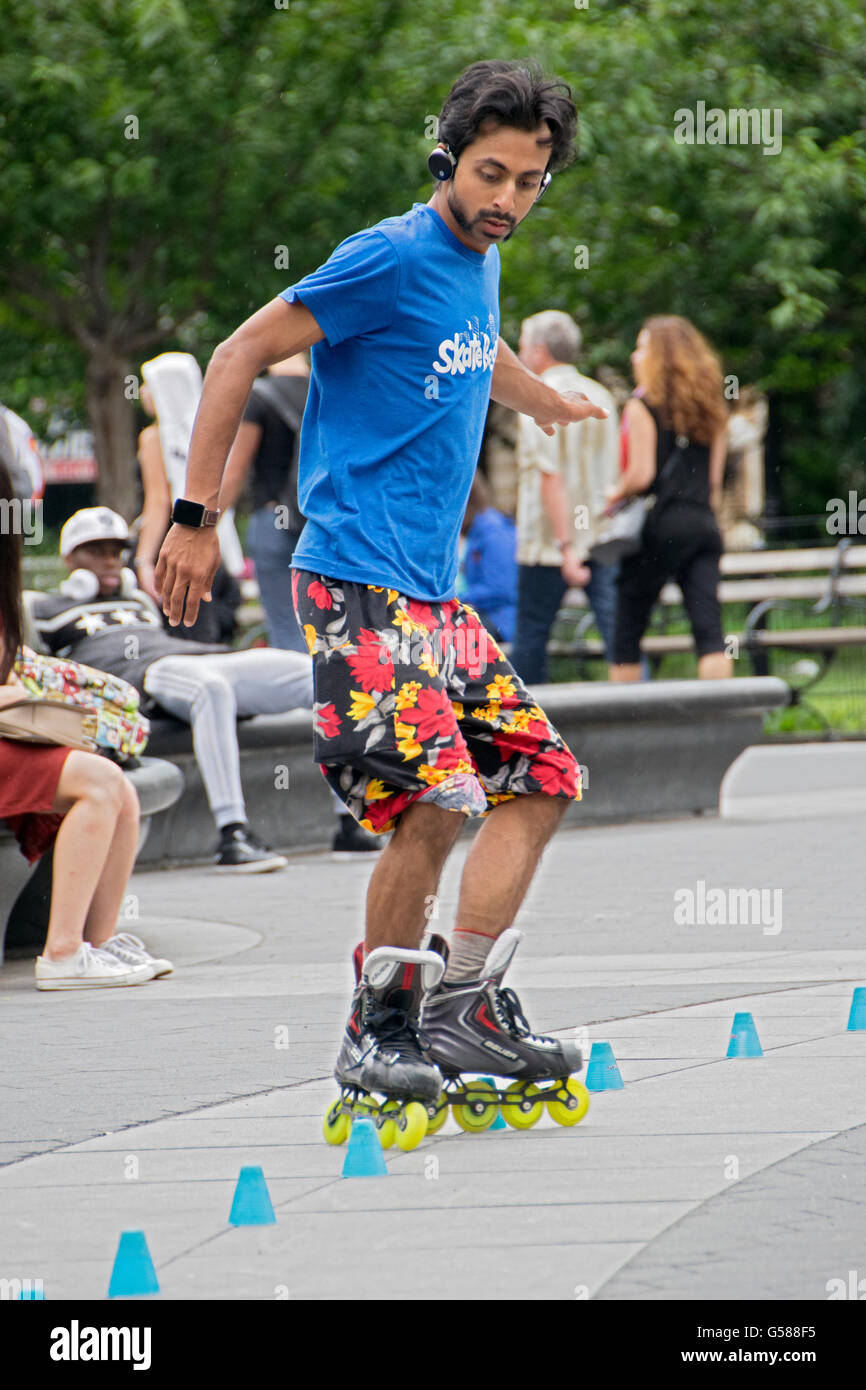 Photo of an inline skater practicing in Washington Square Park in Greenwich Village, New York City Stock Photo