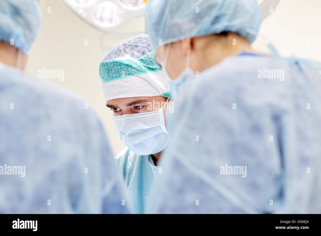 group of surgeons in operating room at hospital Stock Photo - Alamy