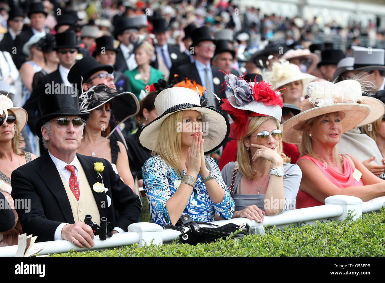 Horse Racing - The Royal Ascot Meeting 2012 - Day One - Ascot Racecourse. Race goers watch the Ascot Stakes during day one of the 2012 Royal Ascot meeting at Ascot Racecourse, Berkshire. Stock Photo