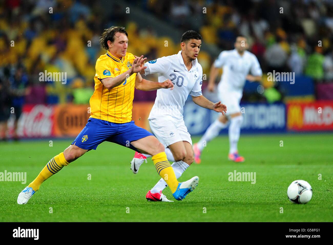 Sweden's Kim Kallstrom (left) and France's Hatem Ben Arfa battle for the ball Stock Photo