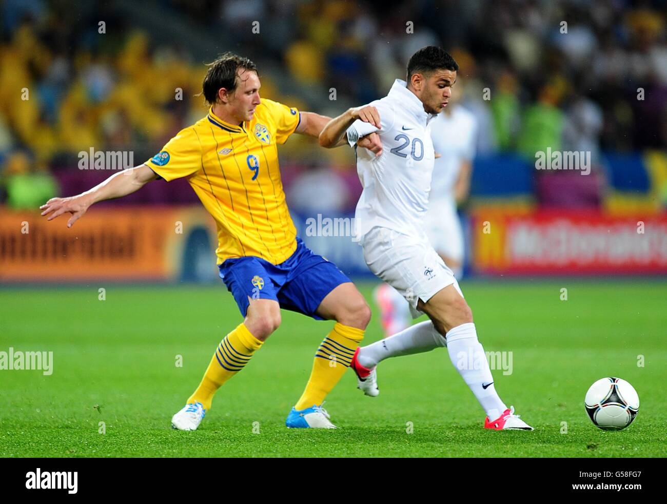 Sweden's Kim Kallstrom (left) and France's Hatem Ben Arfa battle for the ball Stock Photo