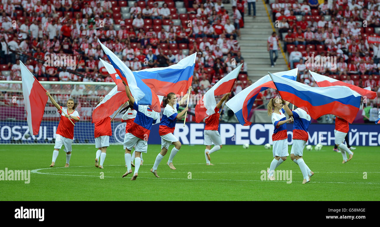 Poland and Russian flags infront of Uefa Respect boards Stock Photo