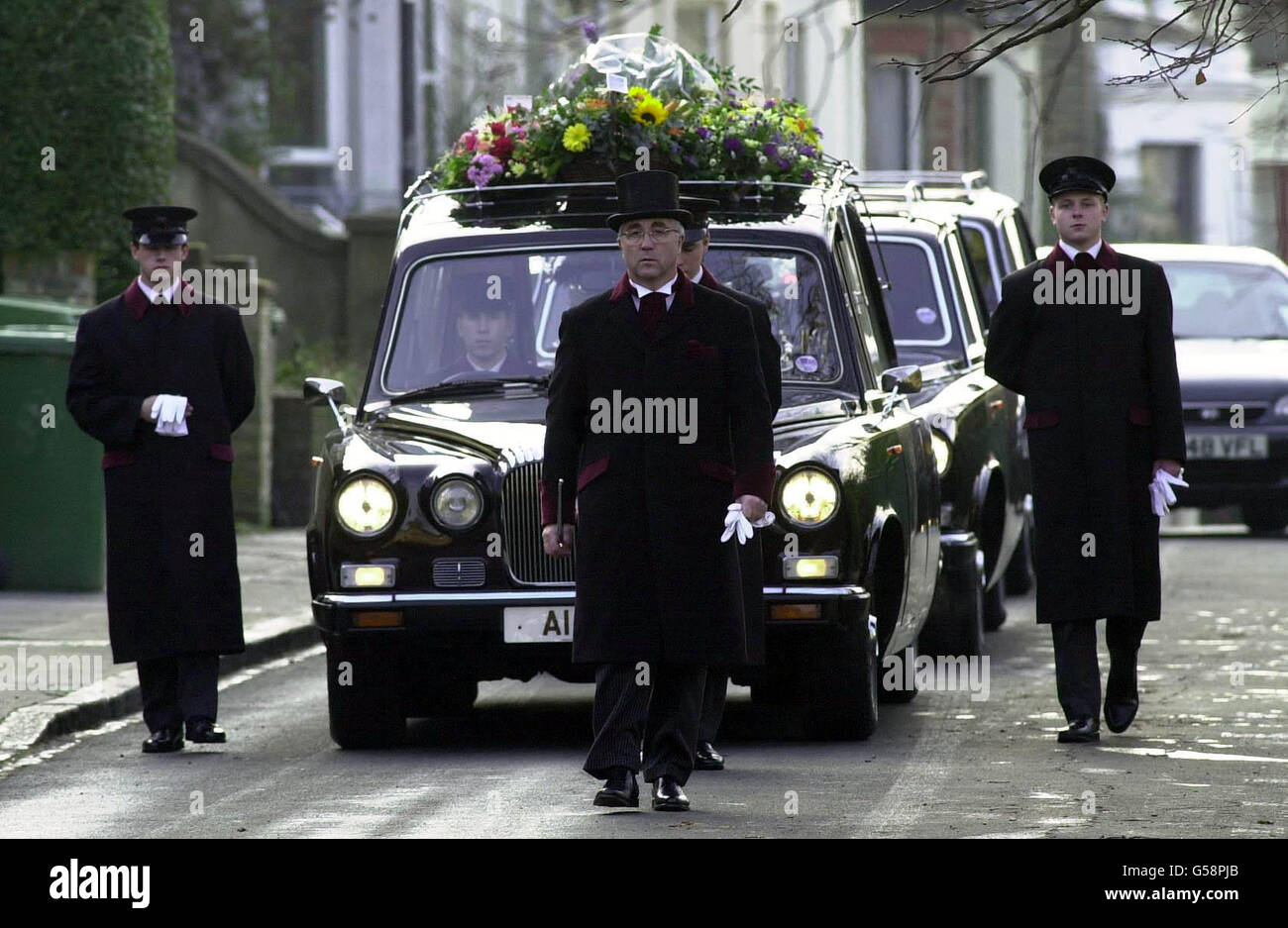 The Funeral Cortege Of 10 year old Damilola Taylor Passes Through A the-funeral-cortege-of-10-year-old-damilola-taylor-passes-through-a