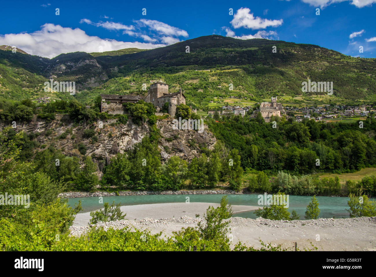 Aosta Valley with Saint Pierre Castle (right) and Village, Italy. Stock Photo