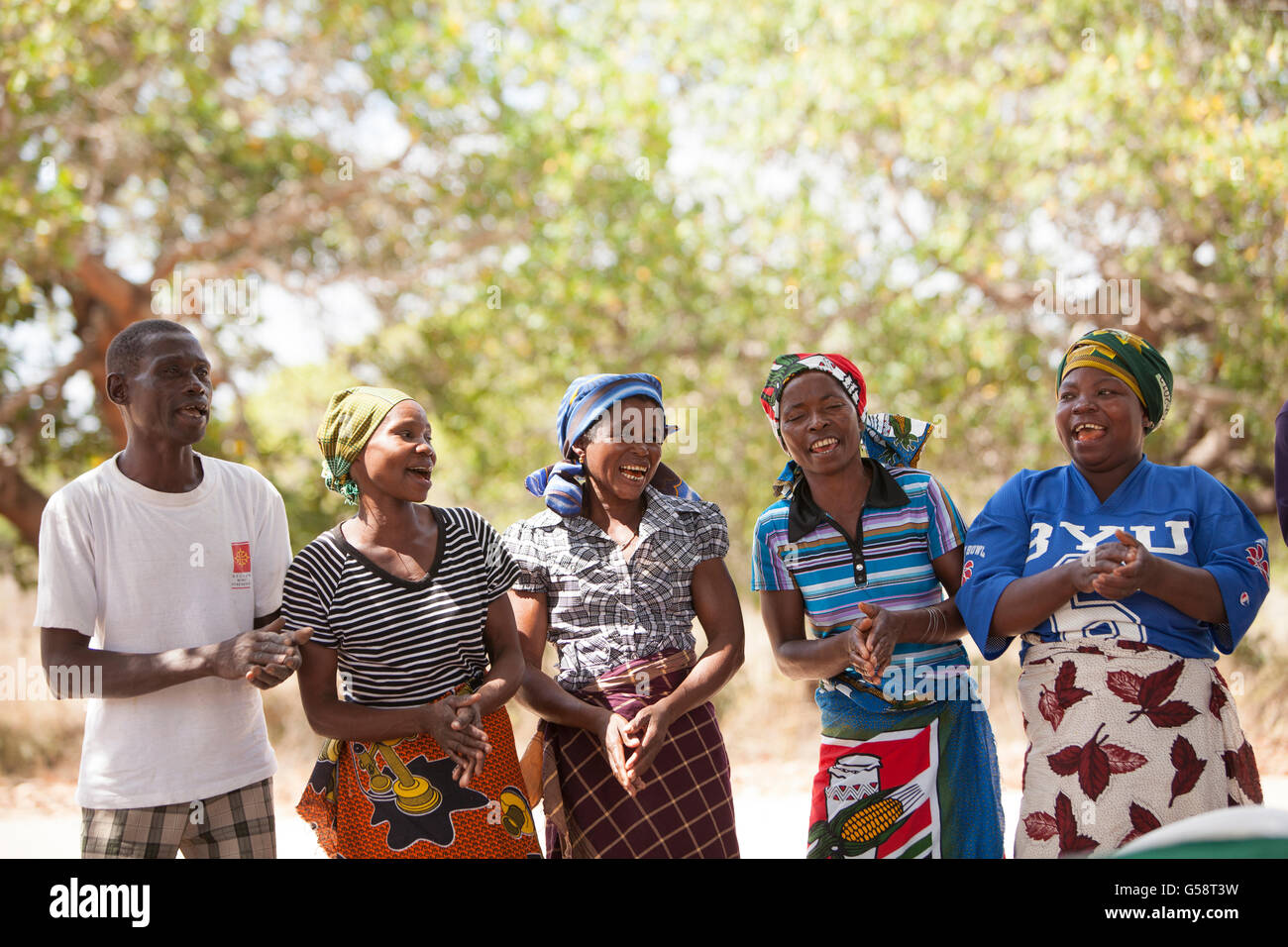 A group of villagers sing together in Nampula Province, Mozambique