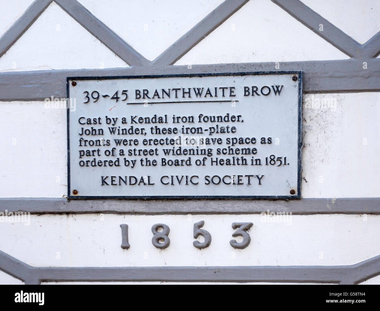 Kendal Civic Society Sign building in Branthwaite Brow Kendal fitted with iron plate fronts to save space for street widening in Stock Photo
