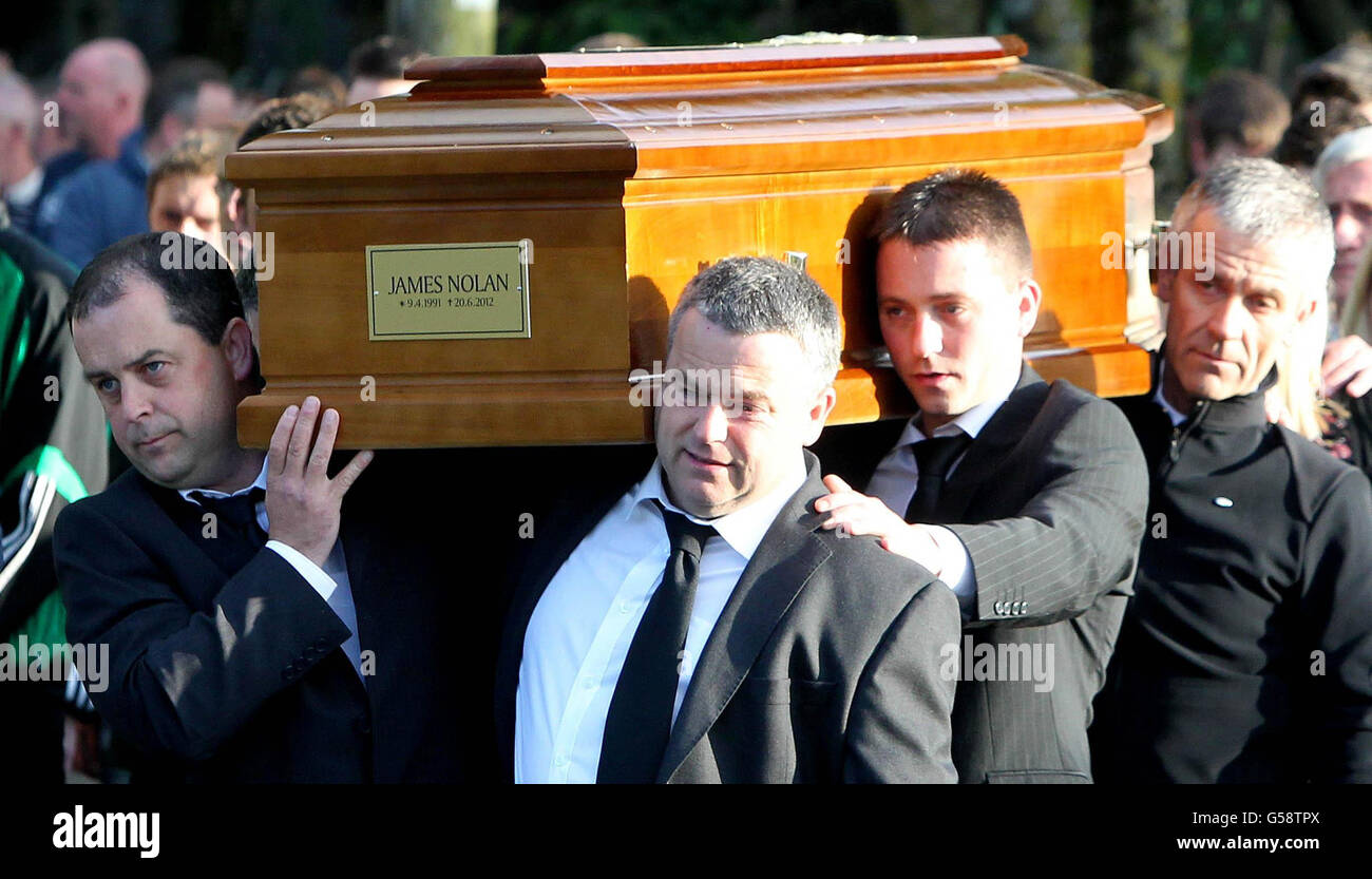 James Nolan's father Jimmy (front right) carries his son's coffin in ...