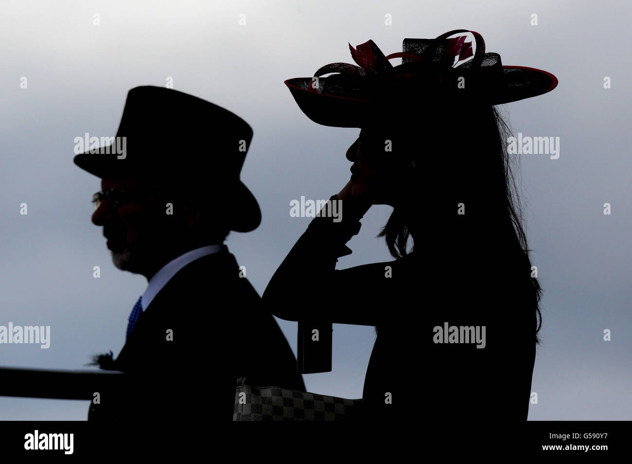 Silhouetted racegoers on day four of The Royal Ascot Meeting 2012 Stock Photo