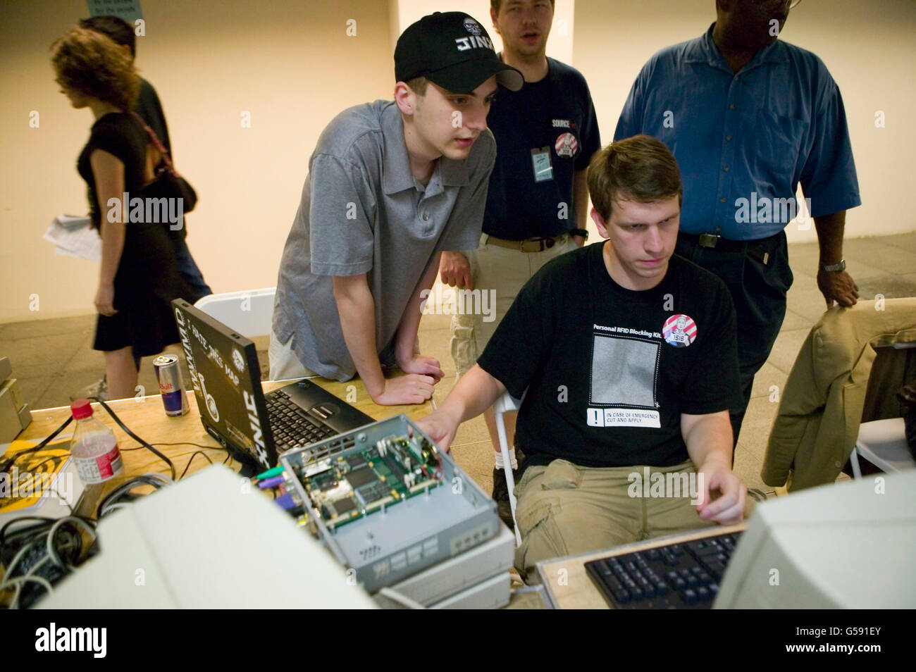 Organizers of the 6th edition of HOPE, an annual hackers' convention, work on setting up a network, July 22nd 2006, New York Cit Stock Photo