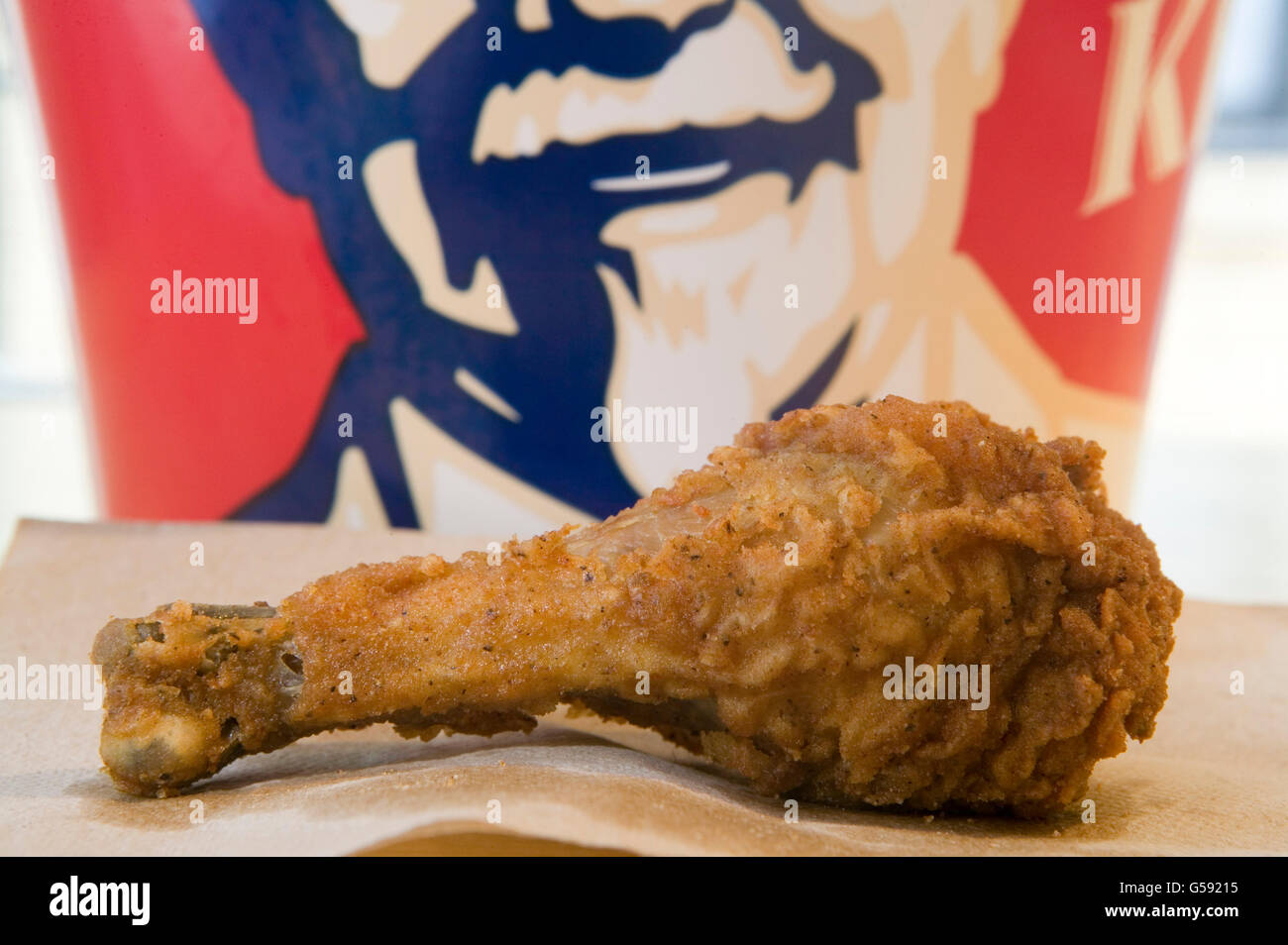In this illustration photo a piece of Kentucky Fried Chicken stands on
